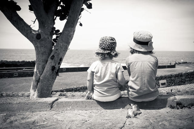 2kids enjoy the view of the beach