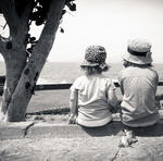 2kids enjoy the view of the beach